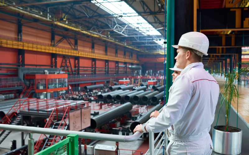 Man looking at the production area of manufacturing